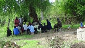 Pastor training in the fields.