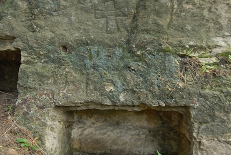Photo: UCA News. "The carved Nestorian cross can be seen above the niche, indicating that this was an early burial place for Christians."