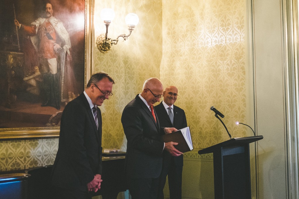 Governor Hurley accepting the first copy of the Gallipoli Centenary Bible, a special edition Bible produced by Bible Society. 