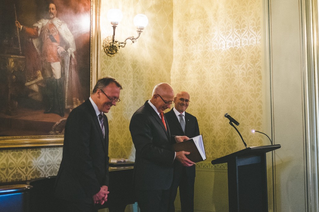 Governor Hurley accepting the first copy of the Gallipoli Centenary Bible, a special edition Bible produced by Bible Society.