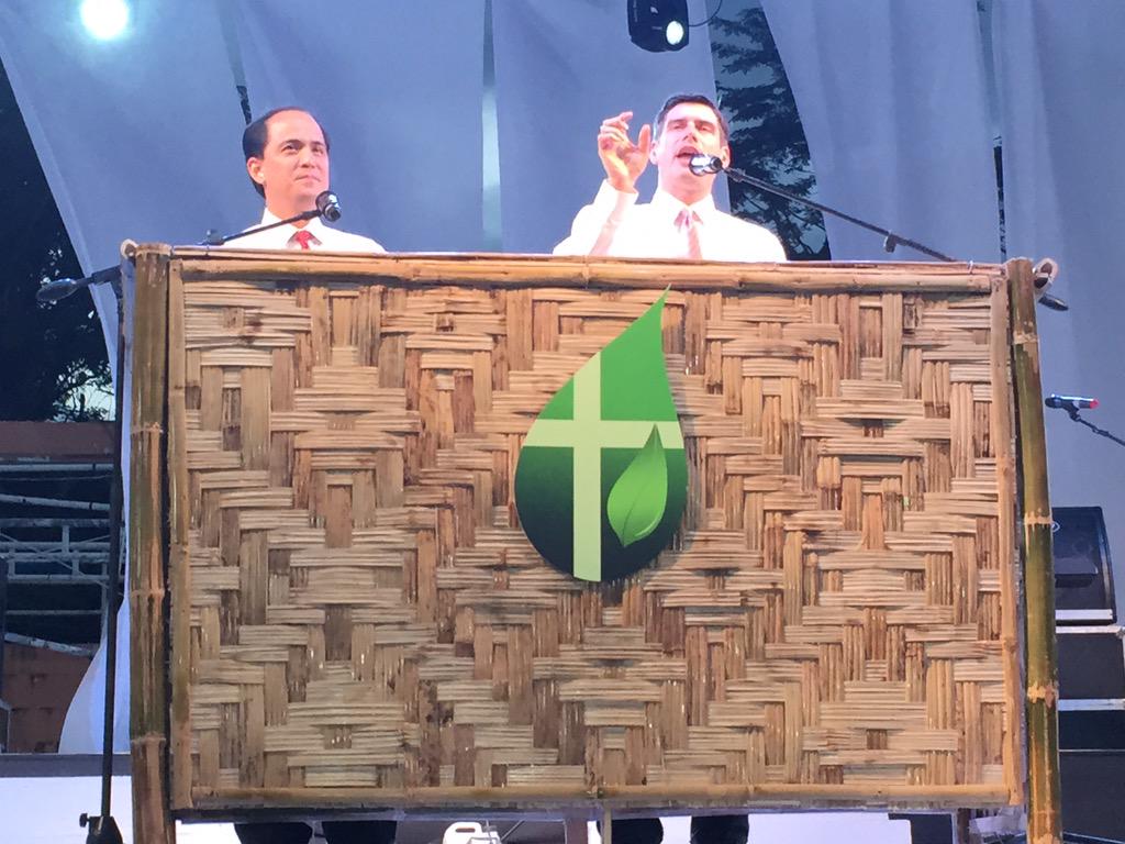 Will Graham (right) preaching hope found in Jesus.