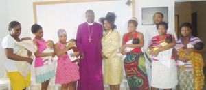 The Bishop with the women he assisted.
