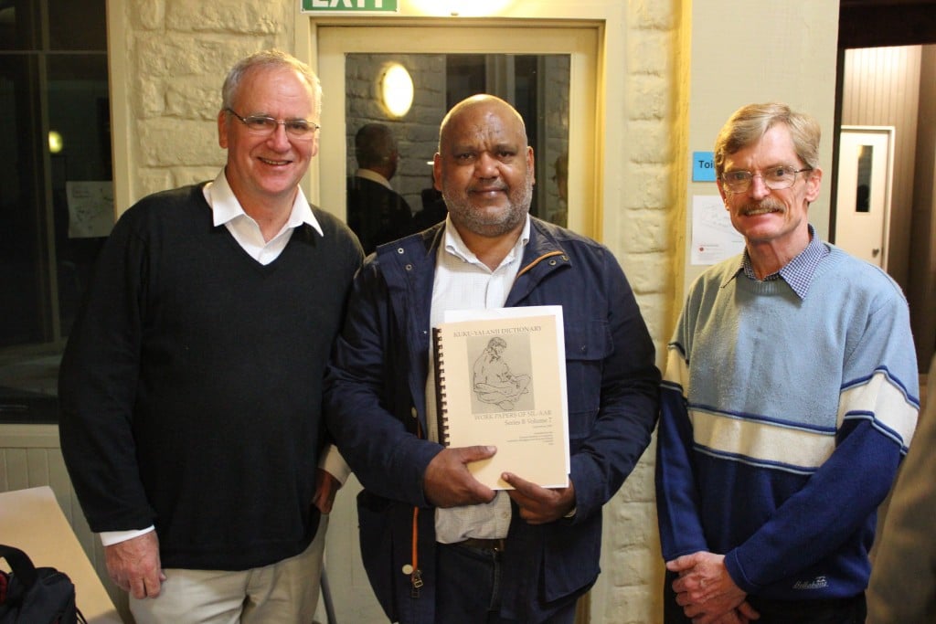 Noel Pearson (centre) is presented with a Kuku Yalanji dictionary (created by the Hershbergers in 1986) reprint by Wycliffe Australia CEO Barry Borneman (left) and translator David Blackman 