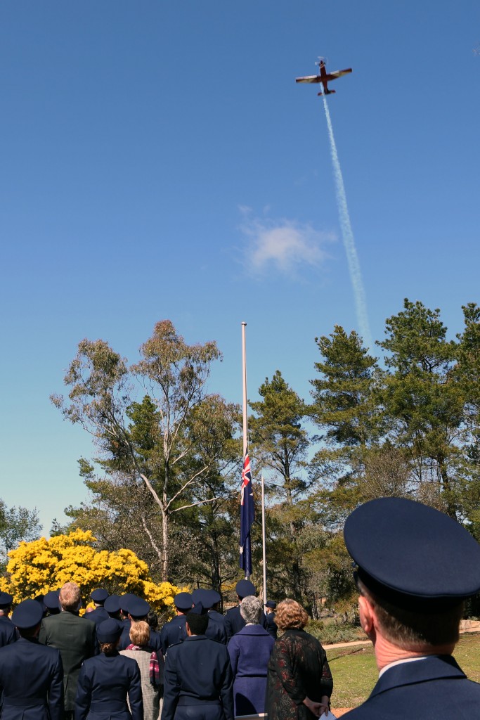 A PC-9 Roulette aerobatic display aircraft, from the Central Flying School in East Sale Victoria, performs a low-level fly-past during the '75th Anniversary of the Chaplain Branch' Commemorative Service. © Commonwealth of Australia, Department of Defence