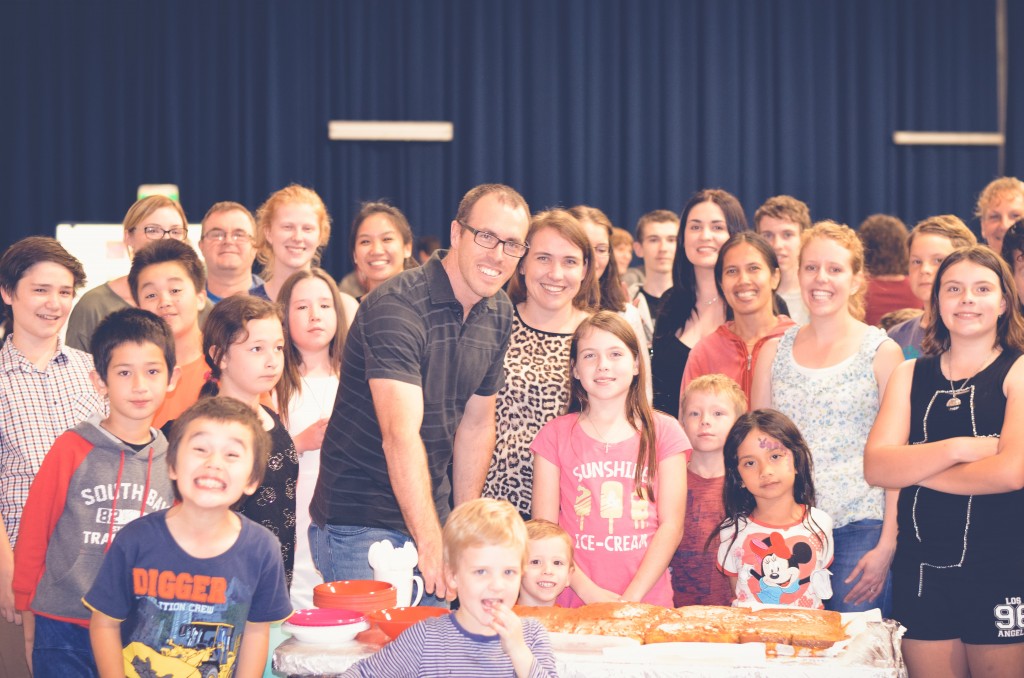 Pastor Jai Wright, centre left, with his congregation.