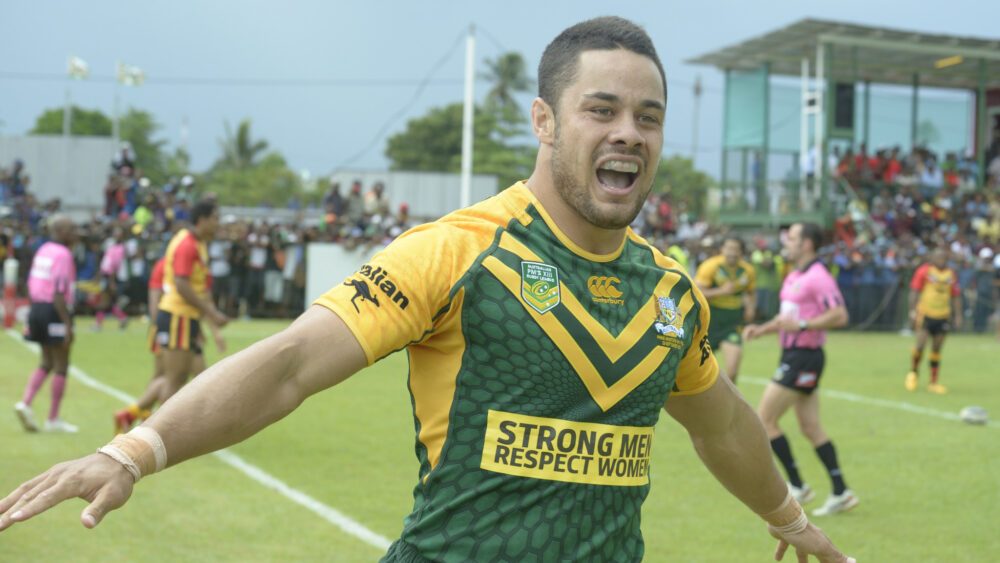 Hayne performing the "Hayne Plane" celebration while playing for the Australian Prime Minister's XIII in 2013.