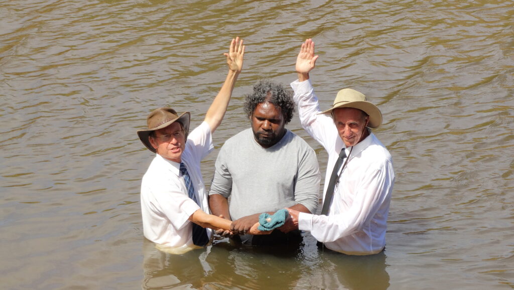Lance Duggie is baptised by Pastors Don Fehlberg, left, David Gilmore.