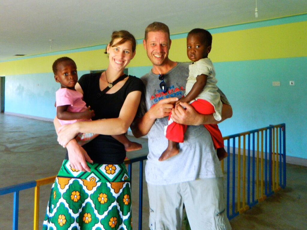 Rob and Tianne Varicak with children in South Sudan.