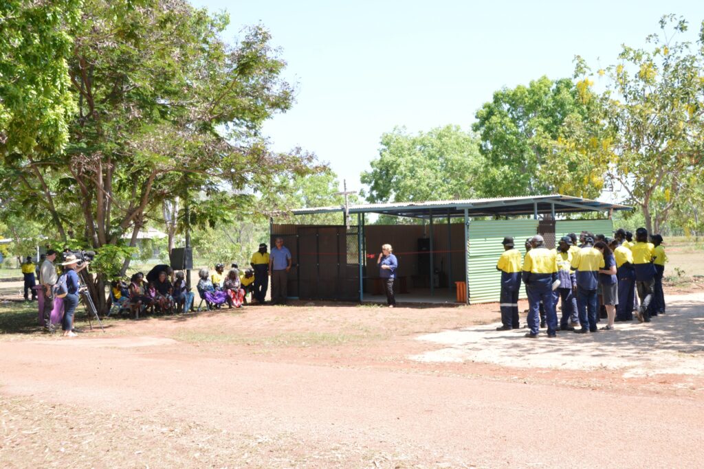 Roper Gulf Regional Council CDP Senior Employment Supervisor Sommer Meadows tells the Manyallaluk community and visiting stakeholders what it took to build a church from discarded materials when it was officially opened on October 17.