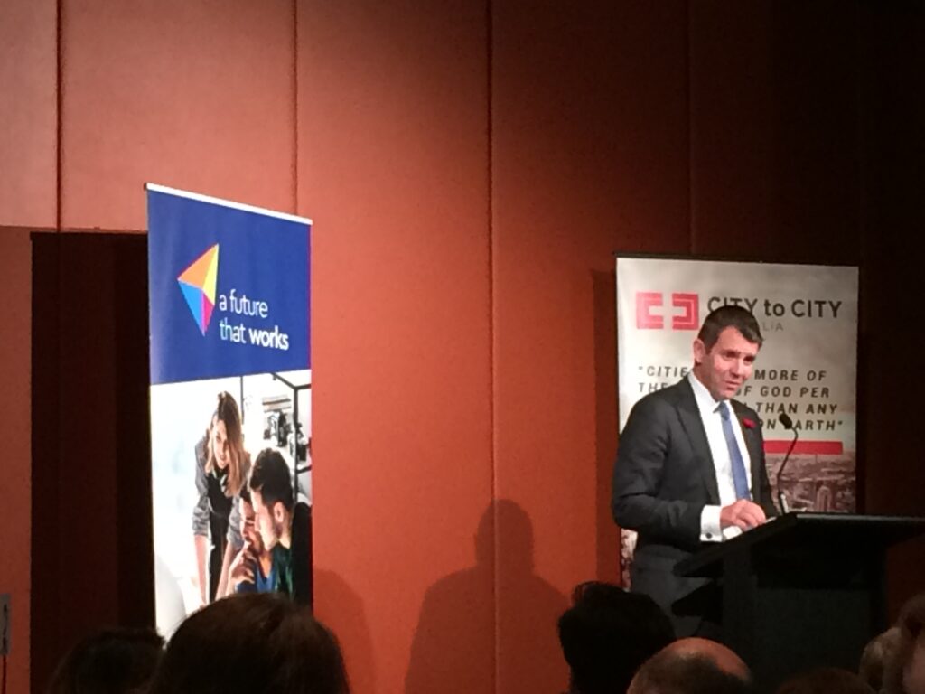 NSW Premier Mike Baird addresses the crowd at the City to City Renewing My Workplace conference