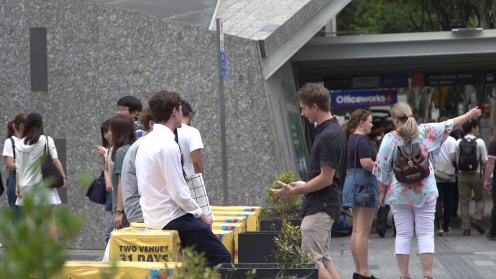 Ryan Hemelaar approaches two young men in King George Mall