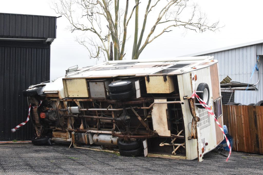 A campervan is toppled by Cyclone Debbie