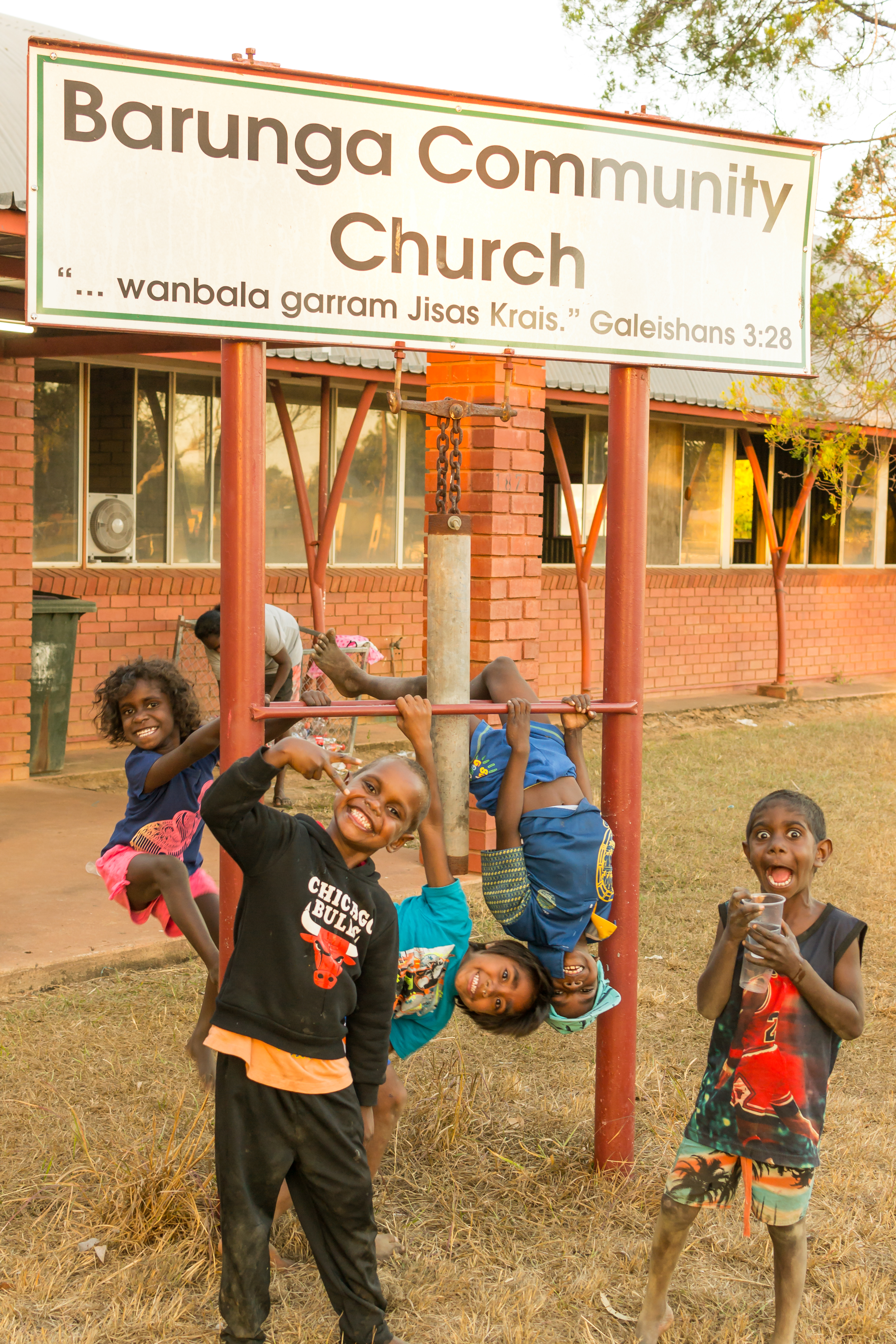 Kids play outside before Kids Club, Barunga