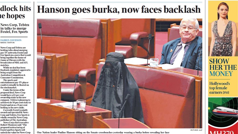 Pauline Hanson wearing a burqa in the Senate, pictured on the front page of The Australian