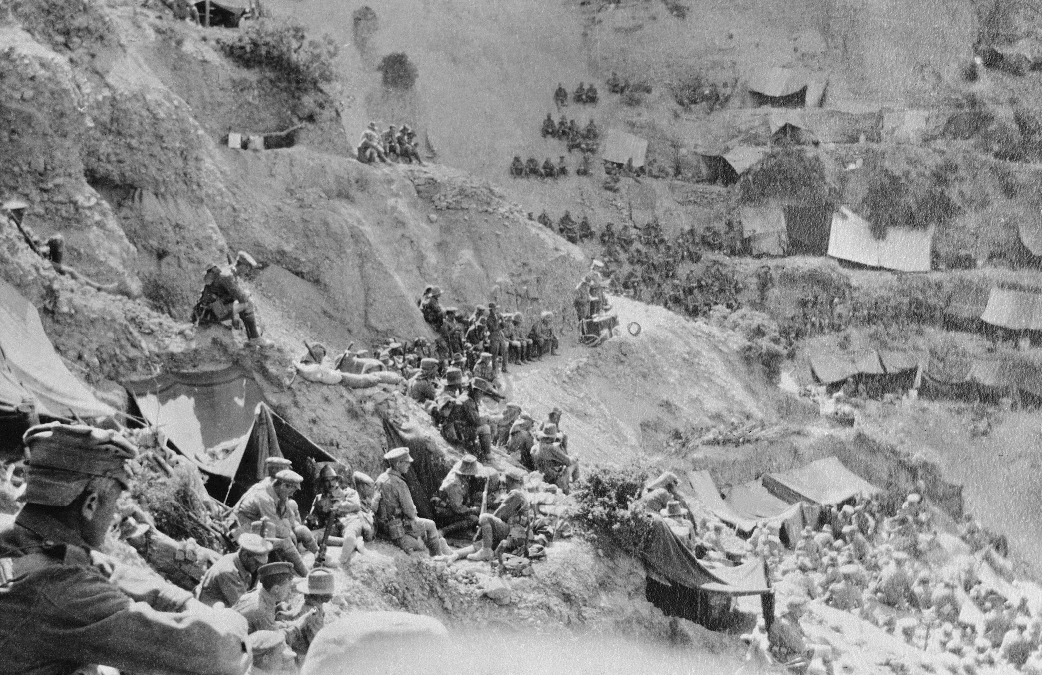 Soldiers attending a church service in Reserve Gully in Gallipoli, being conducted by Chaplain Gillison