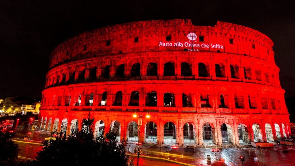 Image result for Roman Colosseum lit red