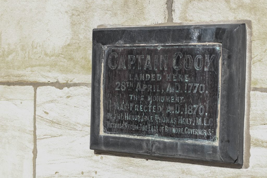 A plaque on the commemorative statue for the first landing of Captain Cook at Kurnell.