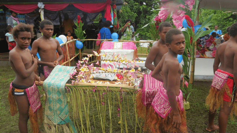 The boys carrying the Havai Scriptures into St Christopher’s Church.