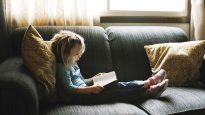 Kid reading Bible