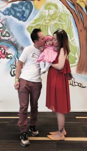 Paul Lee, six-month-old Isabella and Huyen Tran