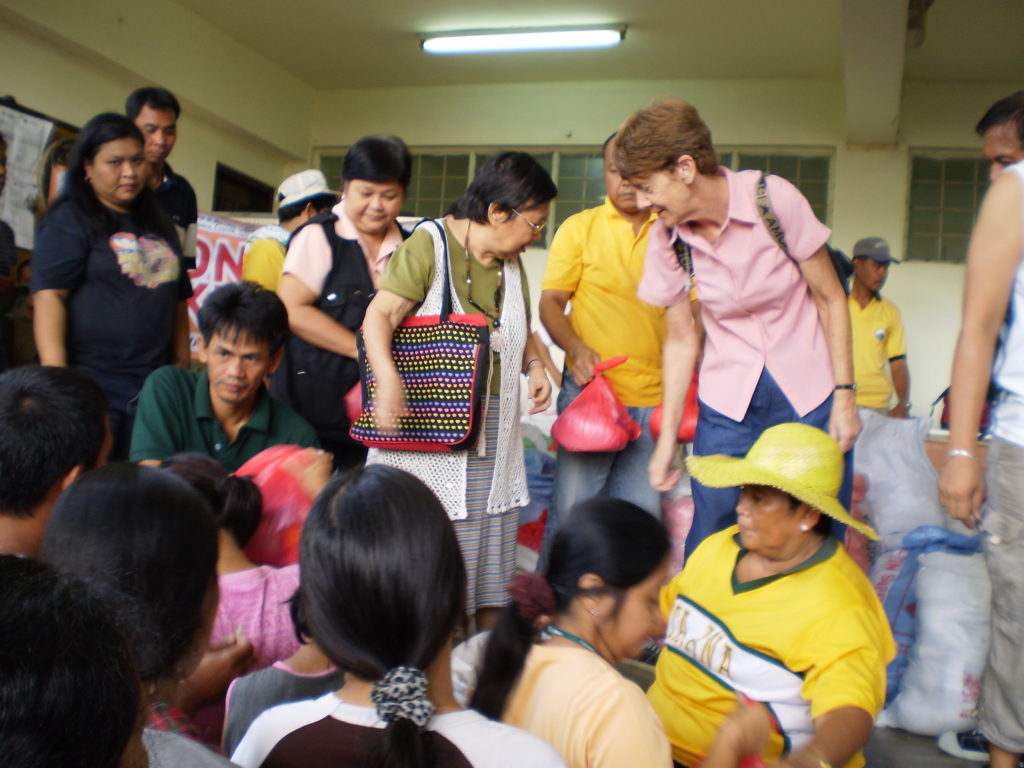 Patricia Fox helps distribute aid in the Philippines.