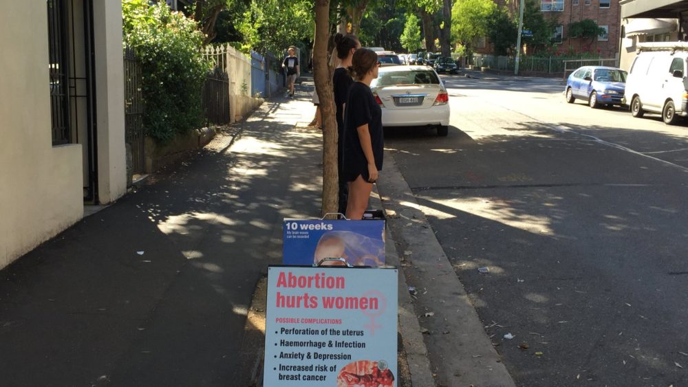 A sign outside a Sydney abortion clinic, from the Helpers of God's Precious Infants, an anti-abortion group.