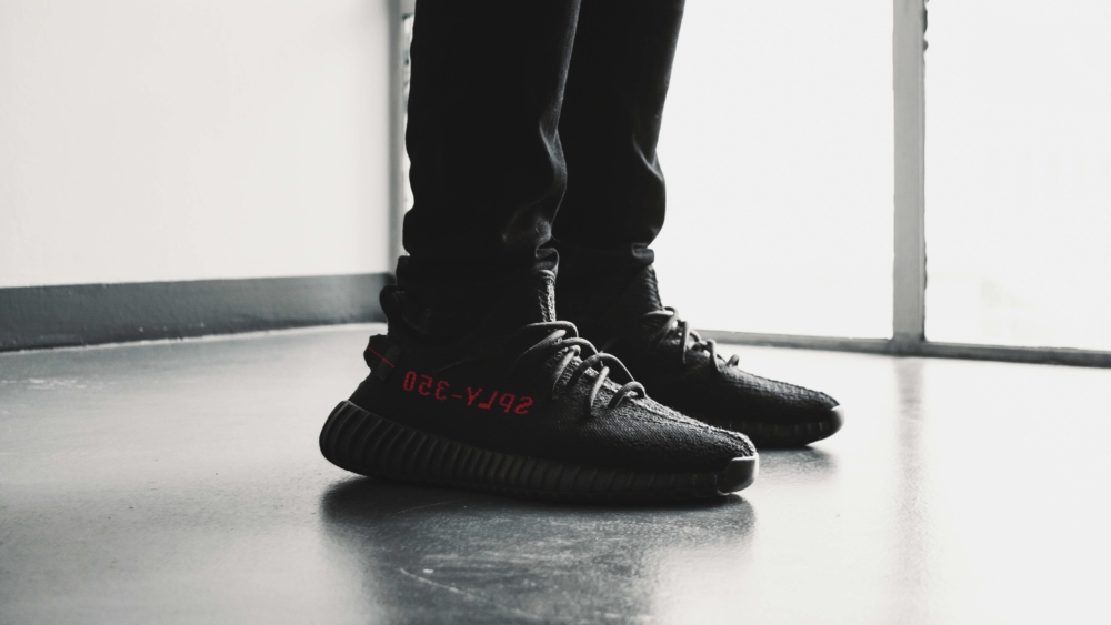 Pair of black Adidas Yeezy Boost 350 V2/ Photo: Reinhart Julian Unsplash