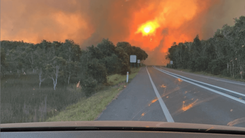 Fires approach Peregian Beach as seen from the car. Image: Jayden Clout