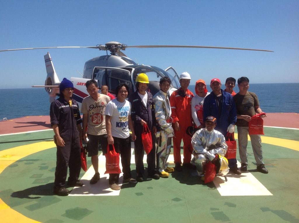 Crew receive a gift bag via helicopter