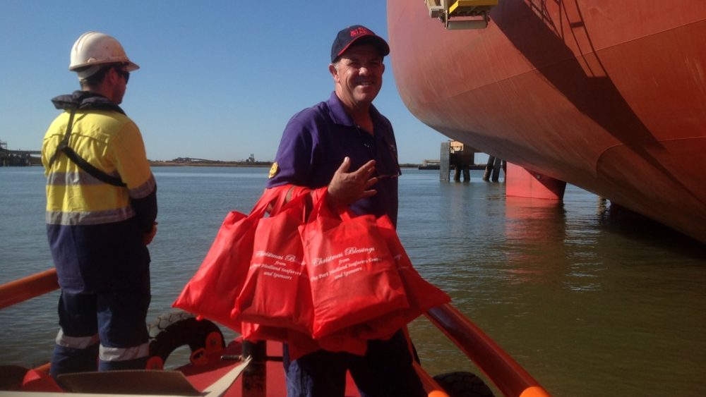 Garry South, Port Hedland chaplain to seafarers, delivers Christmas gift bags.