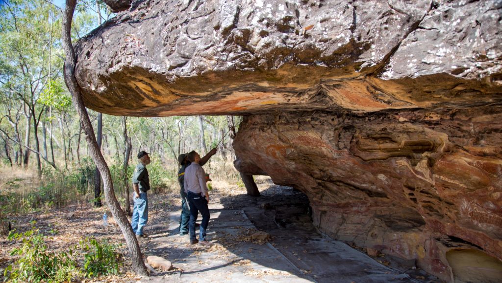Rangers take John Burn on a rock art tour in Laura, north Queensland.