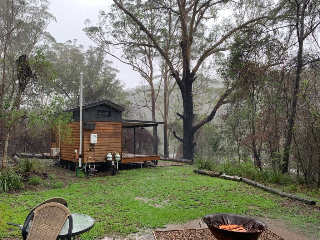 Tallarook Tiny Home Accommodation, Clyde River faced bushfire in August and flood in February when friends had to help tow the home to higher ground.