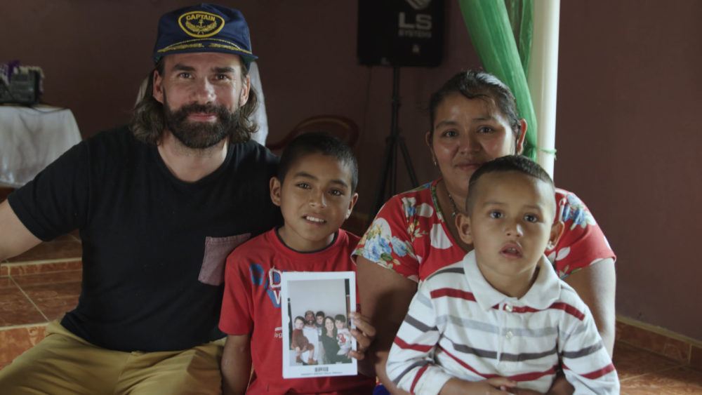 Rend Collective's frontman Gareth Gilkeson with his "Chosen" sponsor child.