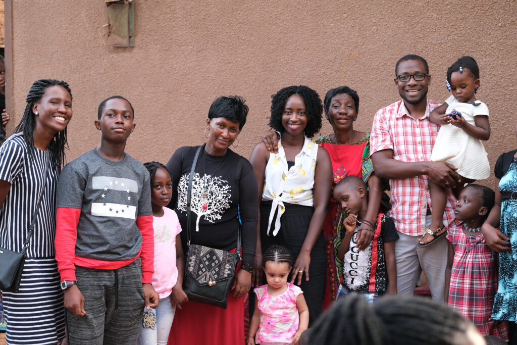 Diana (centre) with her family in Uganda
