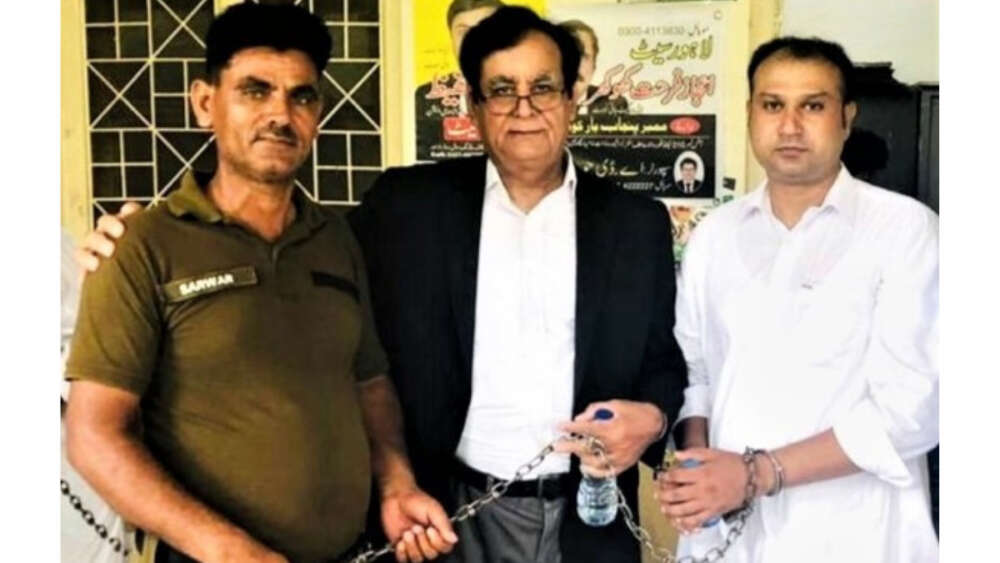 Asif Pervaiz (right) with attorney Saiful Malook (center) at prison. (Morning Star News)