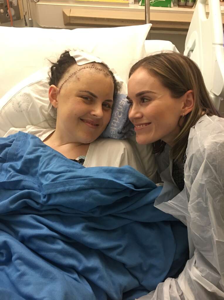 Chelsea in hospital with her sister Chloe