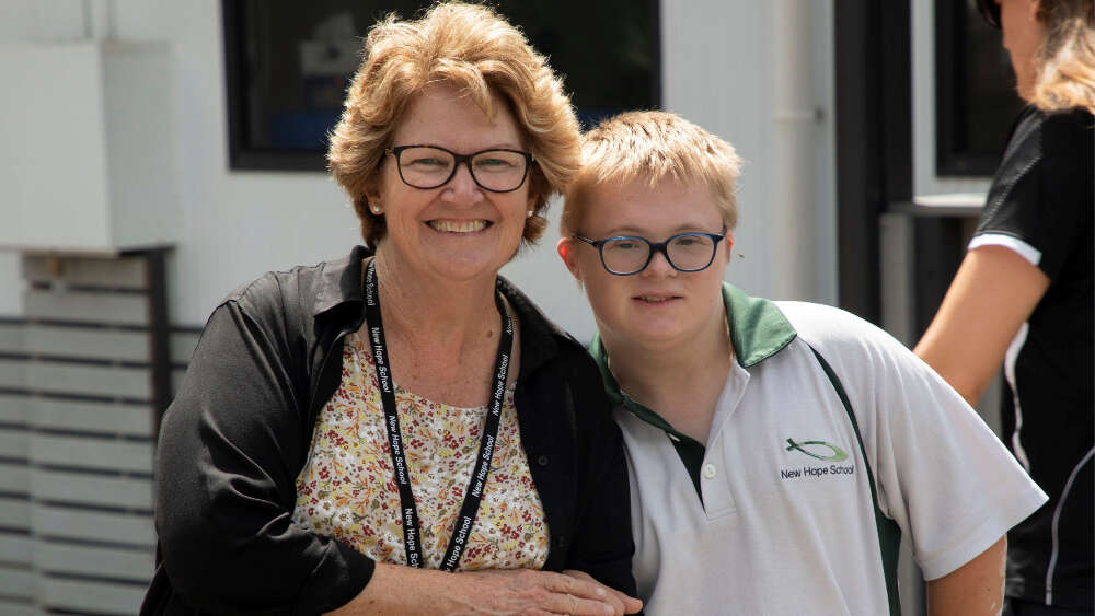 New Hope School teacher assistant Janine Crocker with student BJ Kew