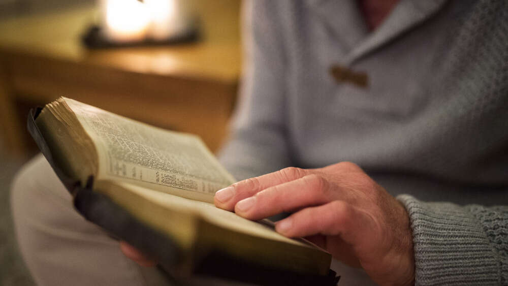 Man reading Bible