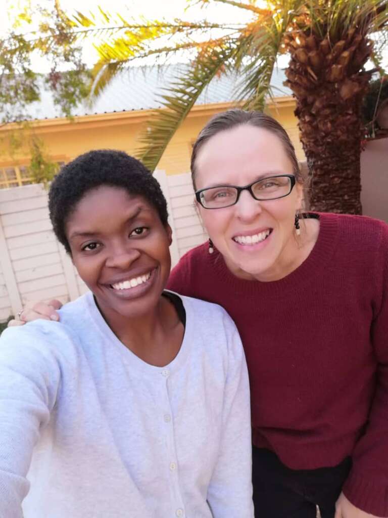 Olivia (right) with Sarah Kwizi