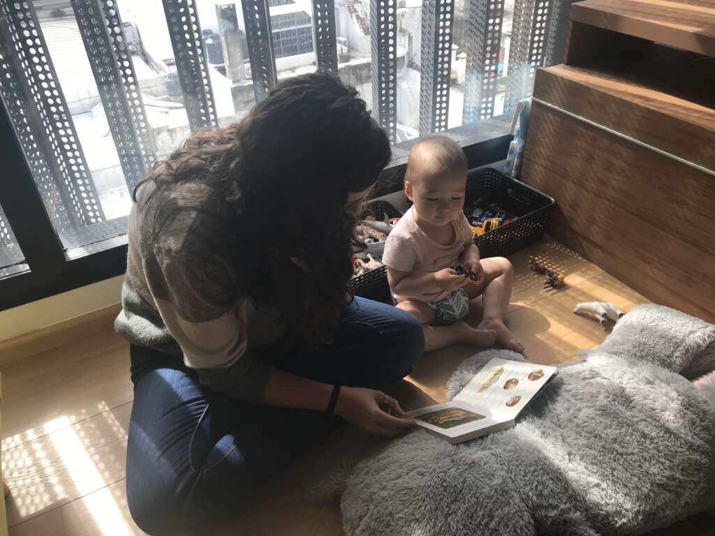 Nikola reads to Zoe
