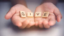 Hands open to give