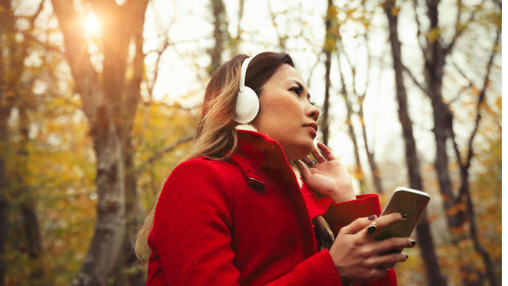 Woman listening to podcast