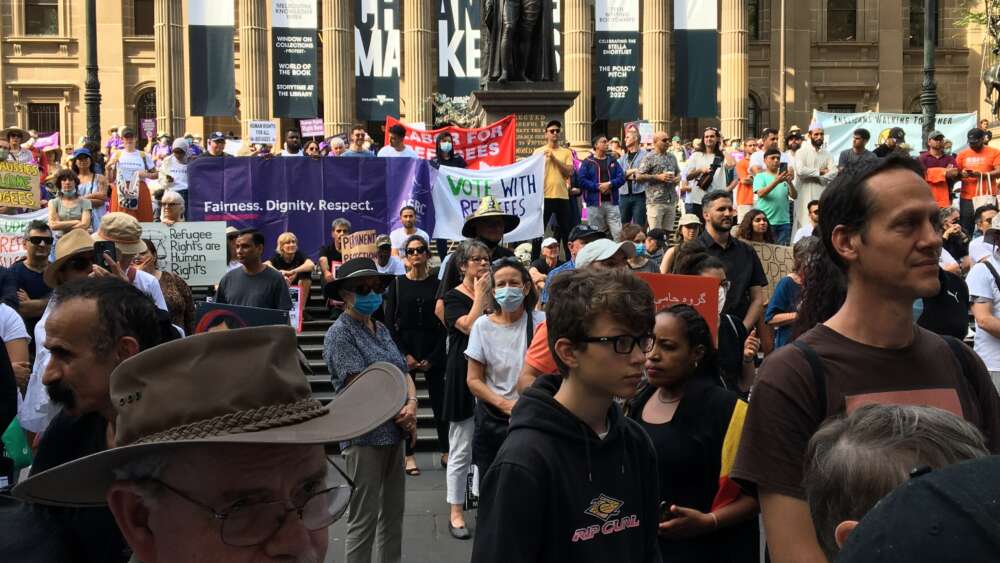 Formula 1, comedy, footy, sunshine and a refugee rally – an ordinary Sunday in Melbourne