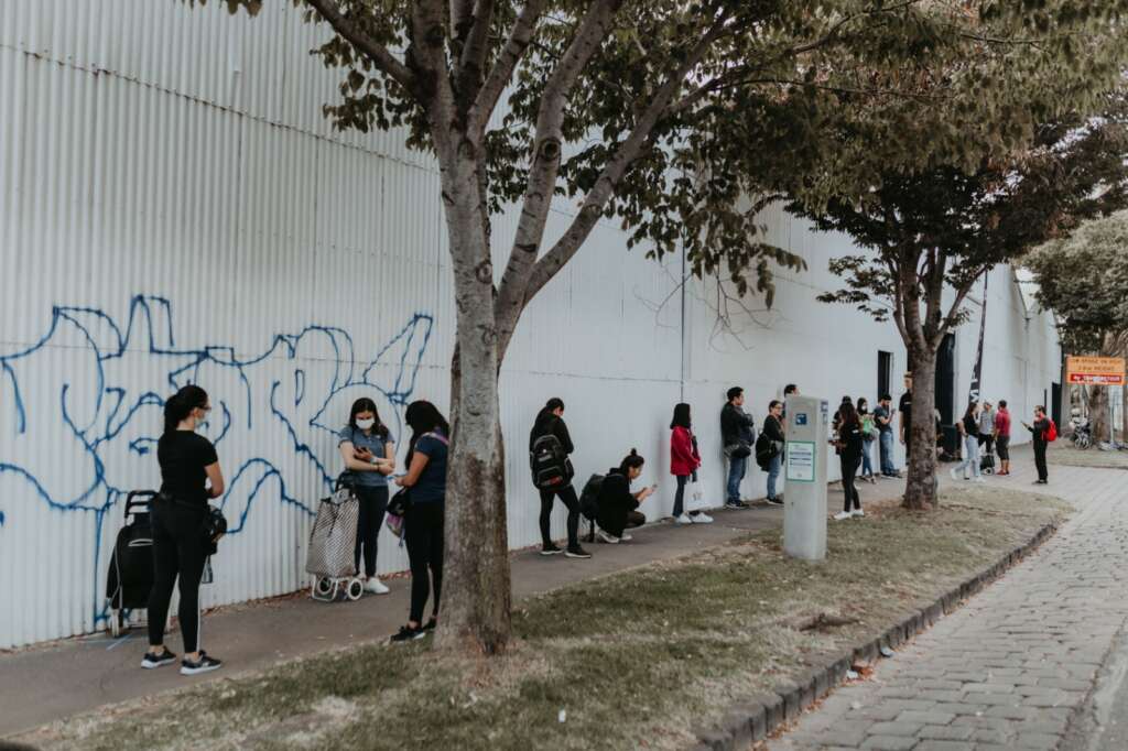 People queue outside Planetshakers food relief centre at Southbank