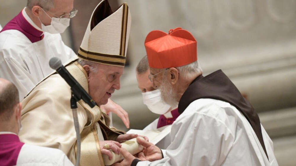 Pope Francis with a new cardinal at a consistory in November 2020. Source: Press Office of the Holy See