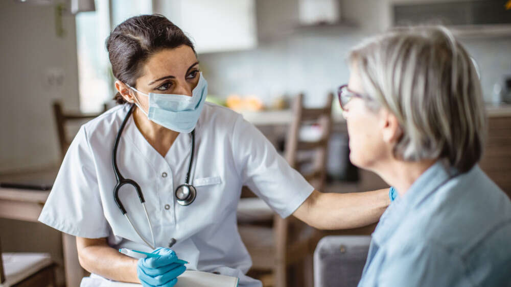 Doctor attending patient