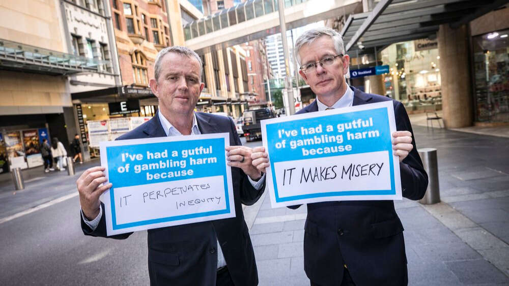 Stu Cameron and Sandy Grant campaign for poker machine reform in NSW