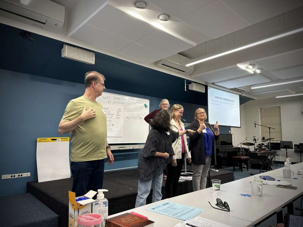 Participants at the Jesus Club Conference 2022 sign a Christmas tune