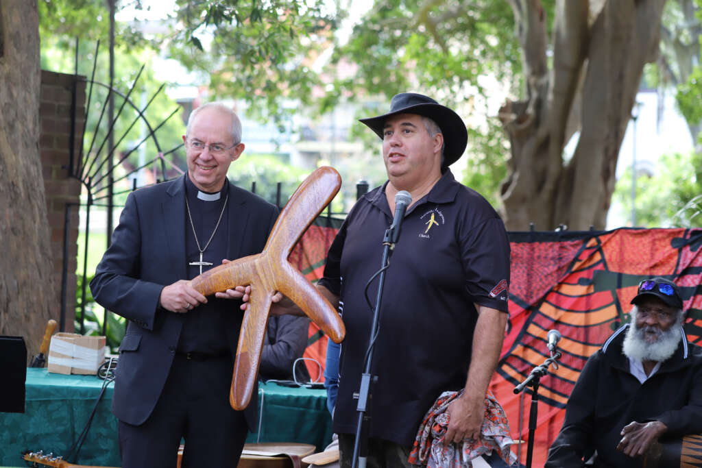 Archbishop Welby receives a boomerang cross from Rev Michael Duckett