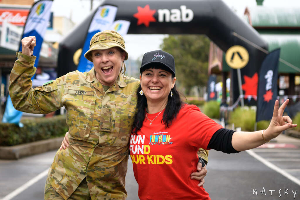 A member of Lismore's 41st battalion with Rebekka Battista